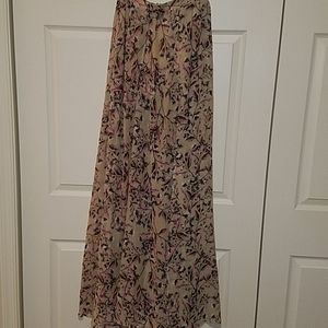 Maxi length floral skirt with two hip waisted slit